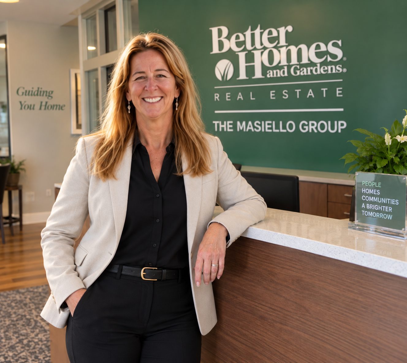 Kathy Ahlin Regional Sales Director standing in the front lobby